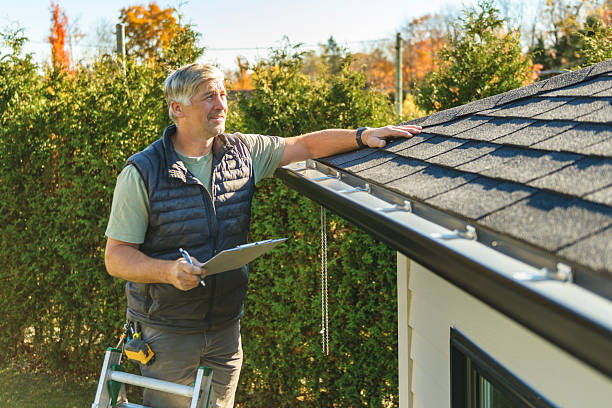 Professional Emergency Roof Repair technician working in Bloomfield, IN